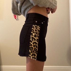 Black skirt with cheetah print strips on sides!